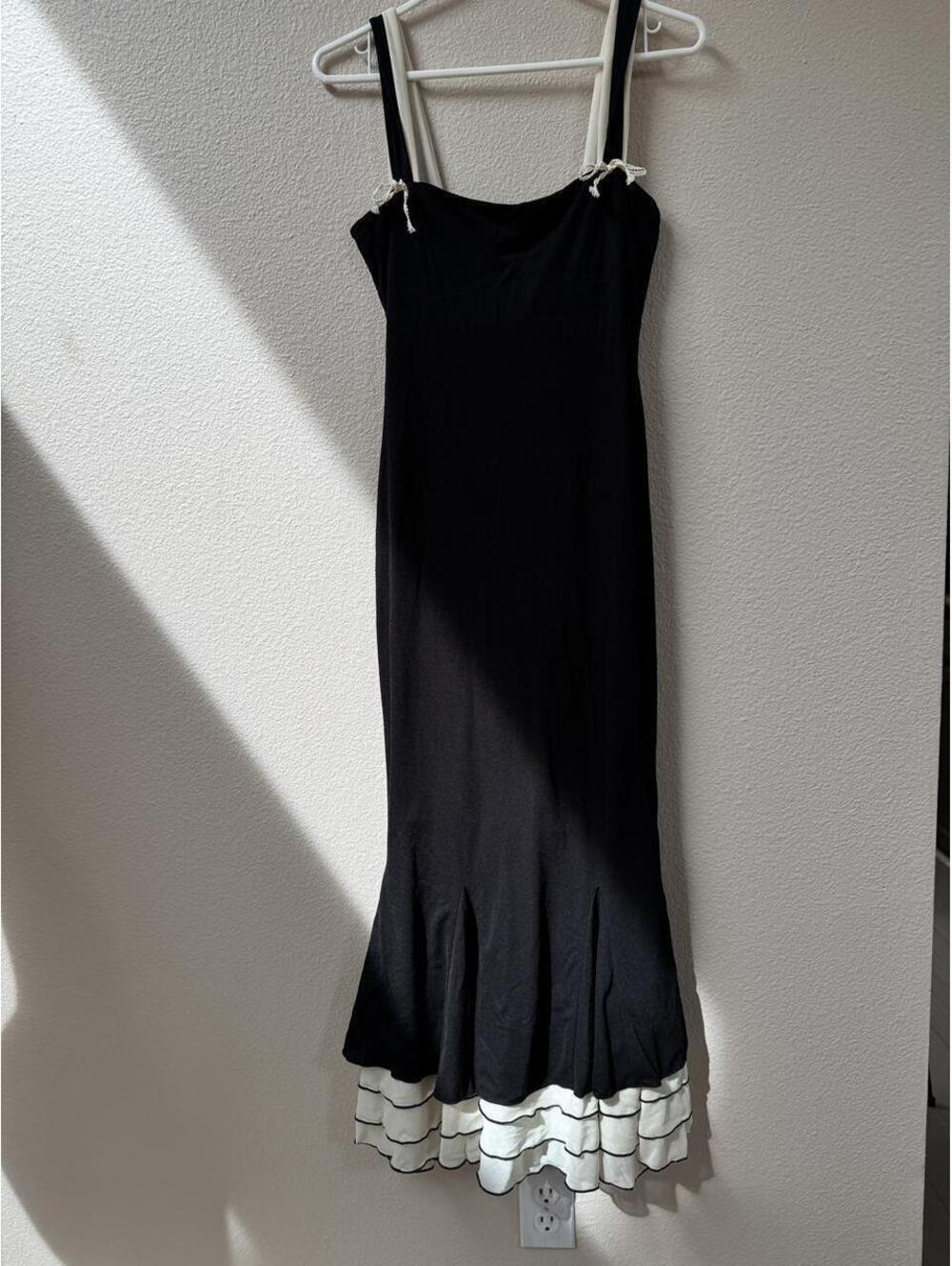 Rihoas black dress with white ruffled hem, size XS